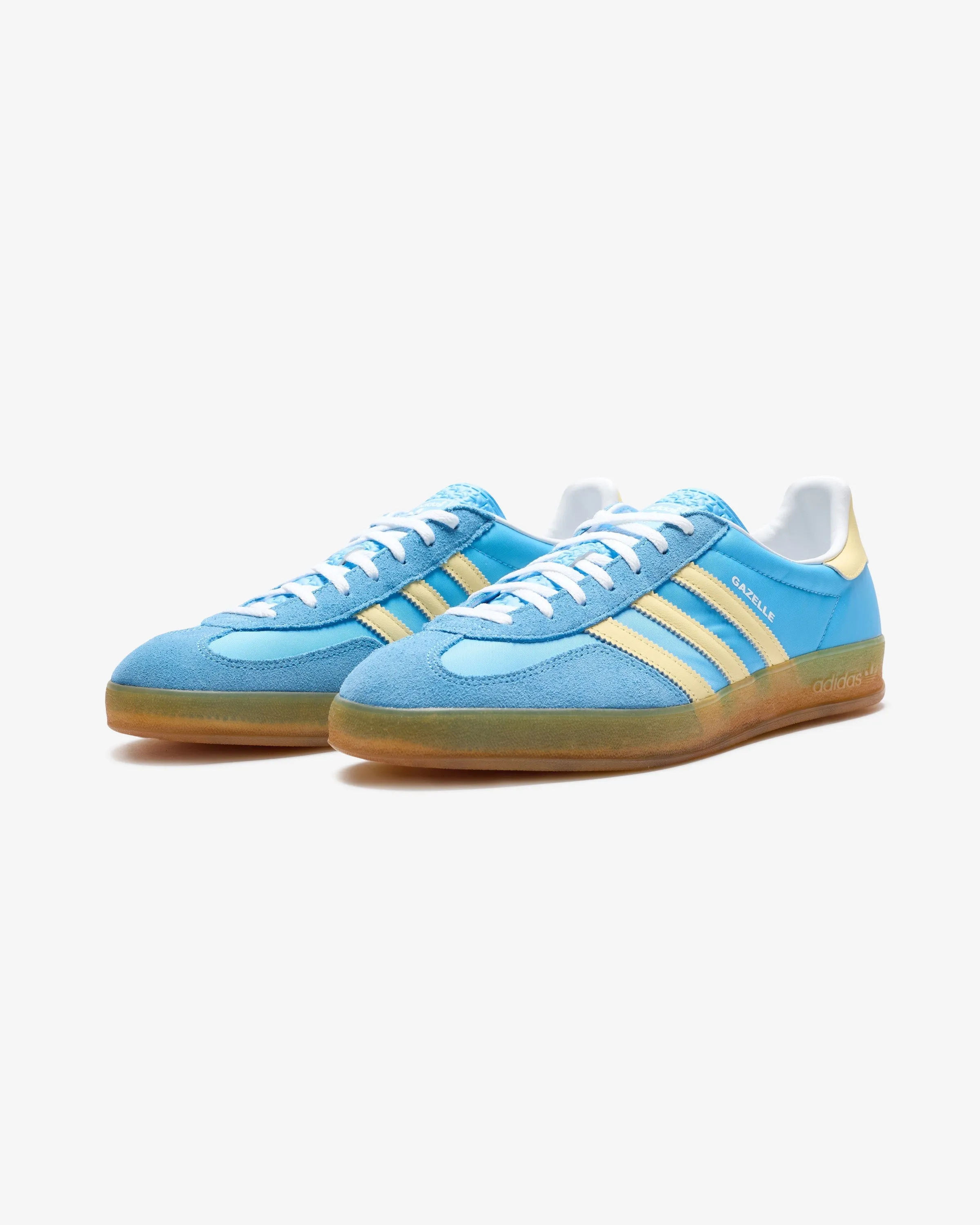 ADIDAS WOMEN'S GAZELLE INDOOR - SEBLBU/ ALMYEL/ FTWWHT Adidas sporty casual shoes with three-stripe design