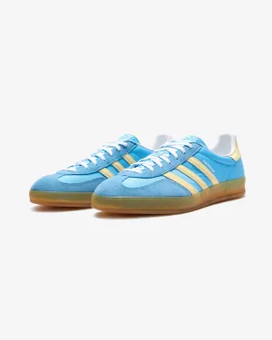 ADIDAS WOMEN'S GAZELLE INDOOR - SEBLBU/ ALMYEL/ FTWWHT Adidas sporty casual shoes with three-stripe design
