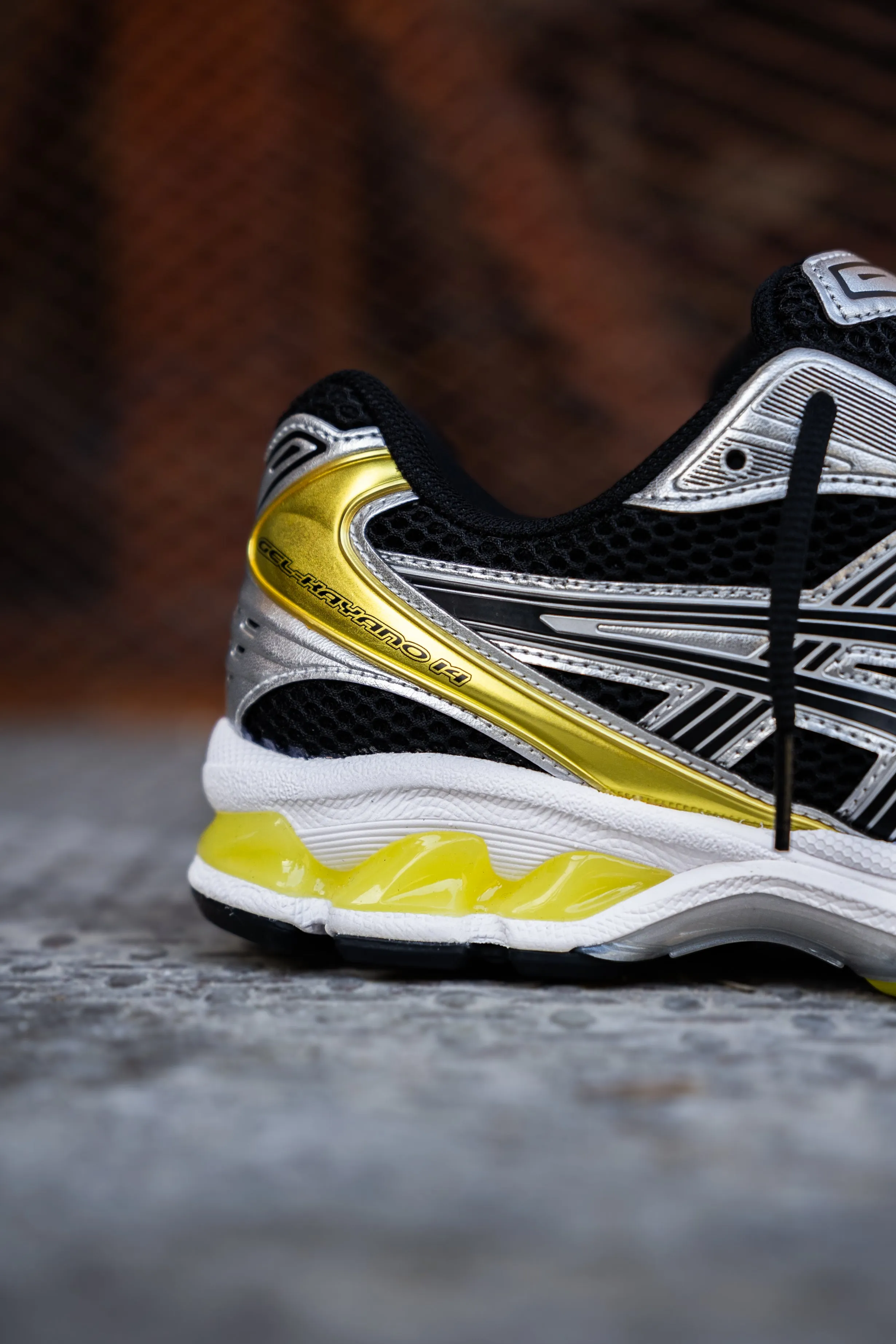 Mens Asics Gel Kayano 14 (Black/Lemon Spark) running shoe close-up shots