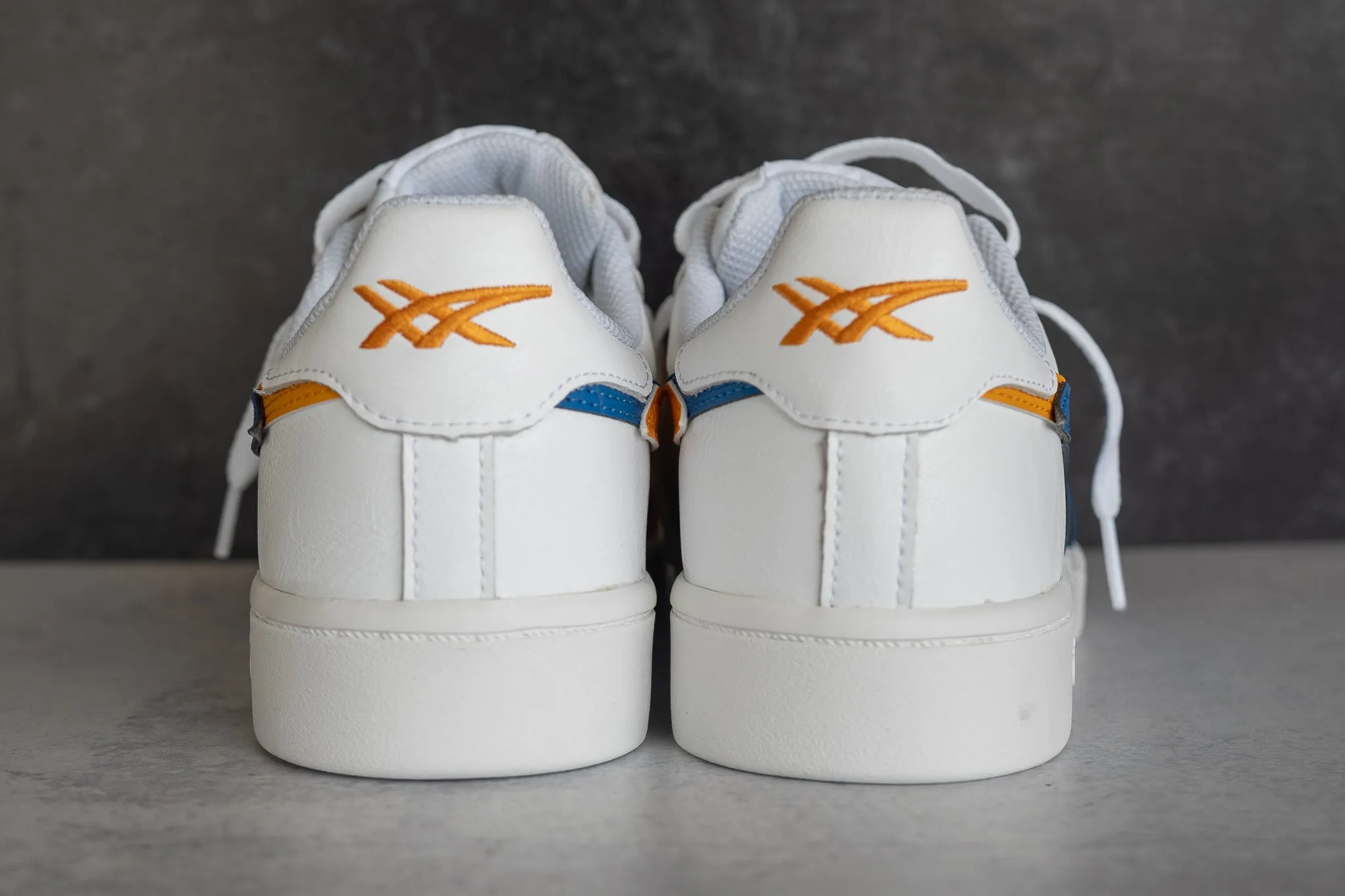 Mens Asics Japan S (White/Lake Drive/Citrus) running shoe close-up shots