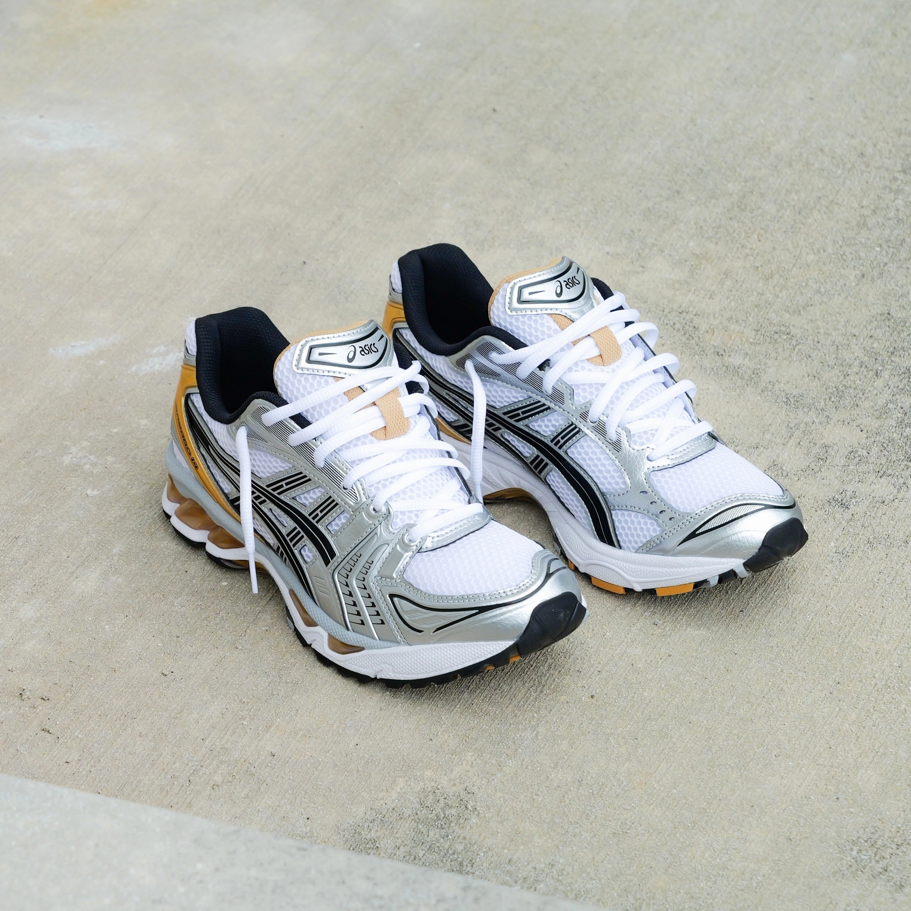 Mens Asics Gel-Kayano 14 (White/Pure Gold) running shoe close-up shots
