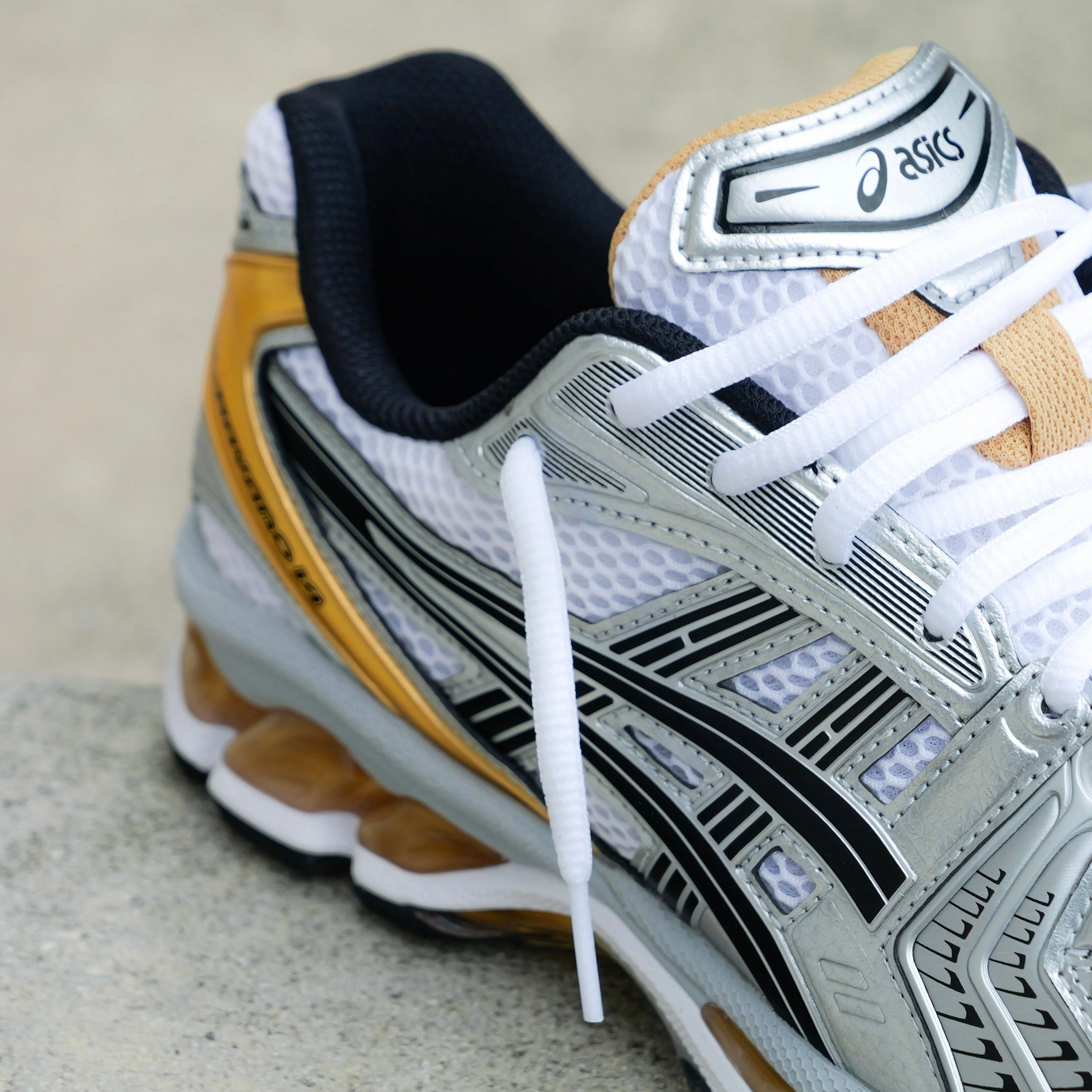 Mens Asics Gel-Kayano 14 (White/Pure Gold) running shoe close-up shots