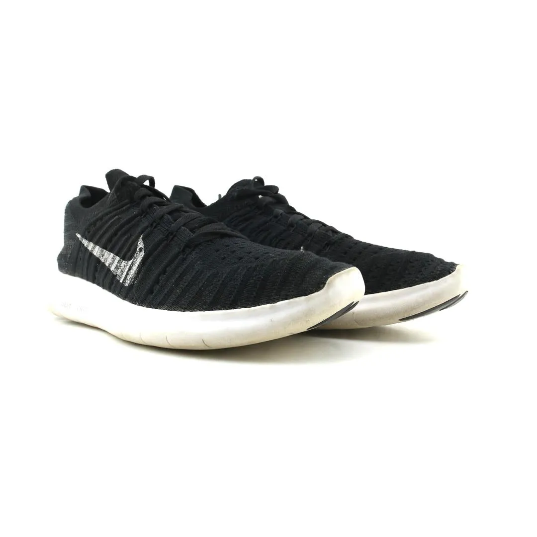 NIKE  FREE RN FLYKNIT sleek Nike sneaker angles