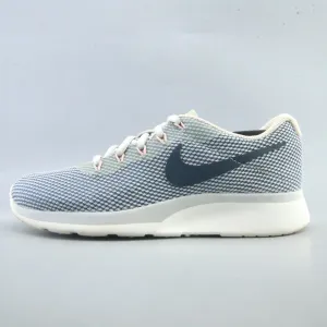 NIKE TANJUN Nike sleek running shoe styles