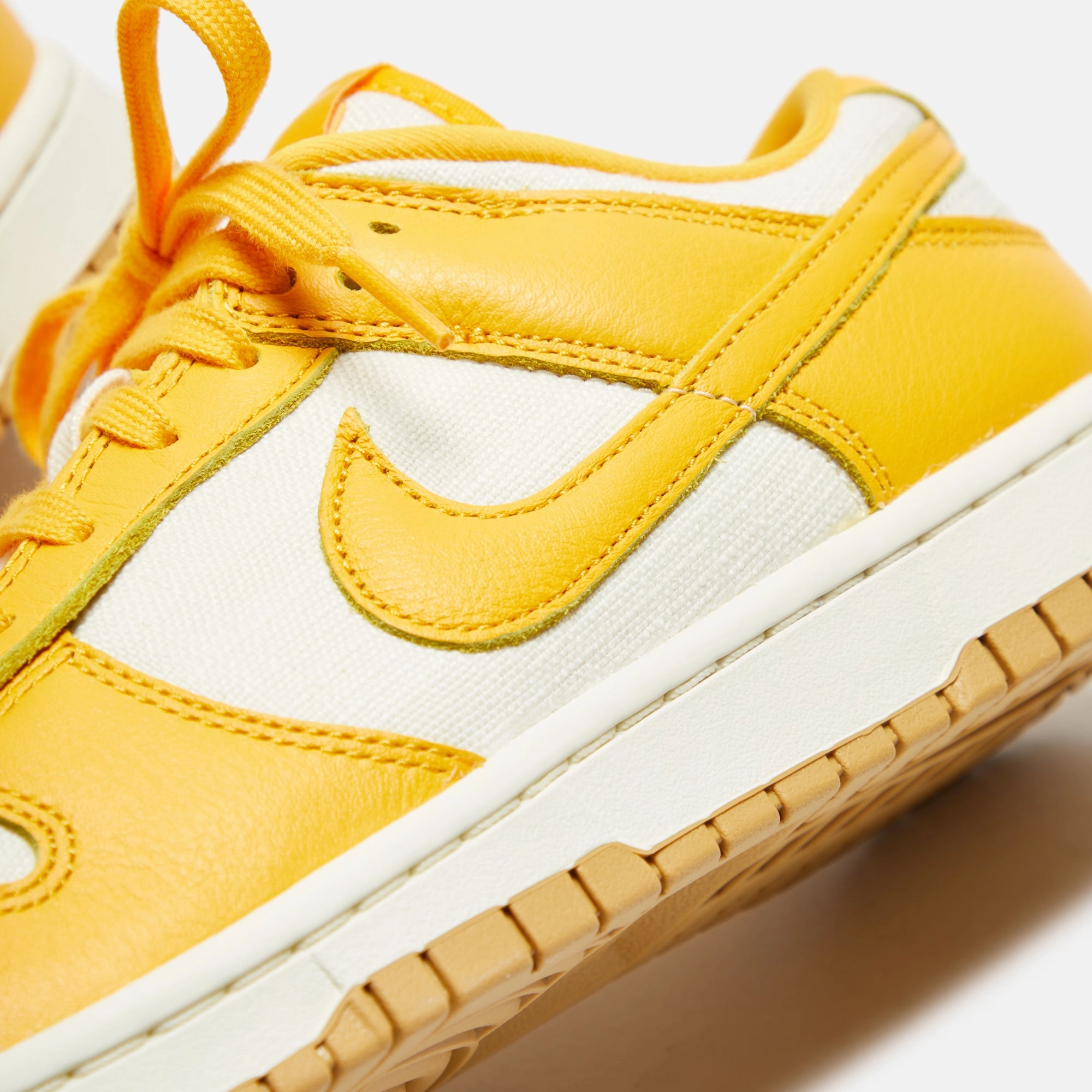 Nike Dunk Low Retro - University Gold / Coconut Milk / Soft Yellow / Gum Light Brown Nike performance sneakers