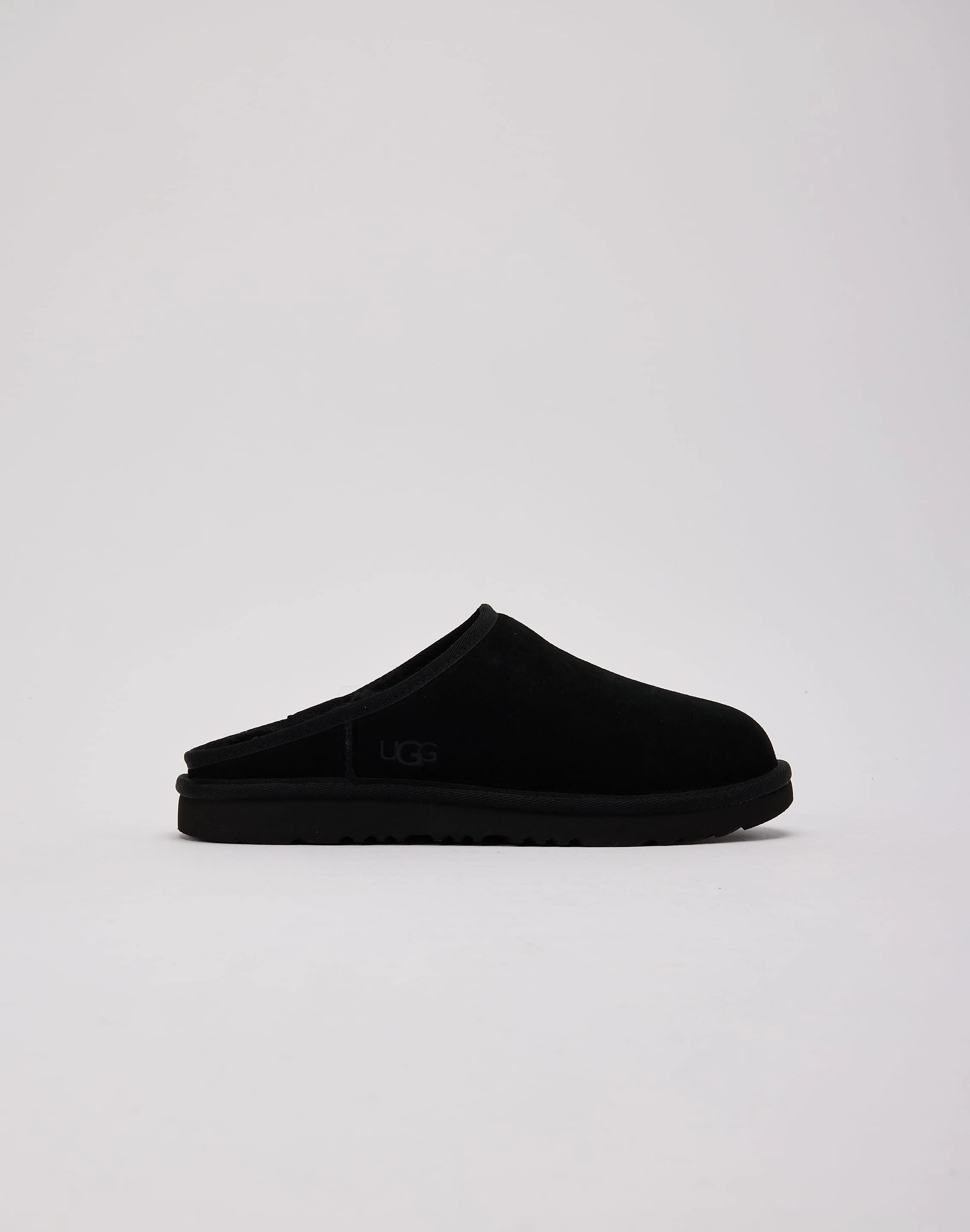 UGG Classic Slip-On Grade-School Ugg cozy shoes with warm lining